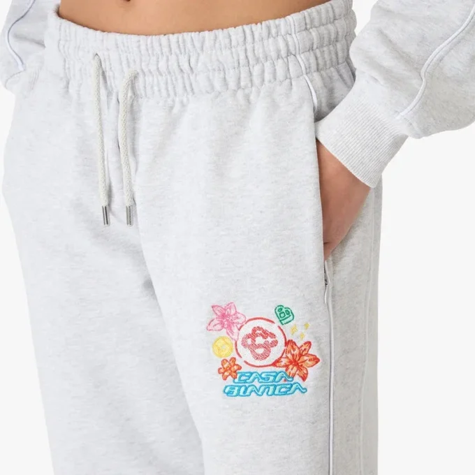 Grå broderede cropped sweatpants