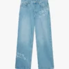 Graffiti-distressed denimjeans Graffiti-distressed denimjeans