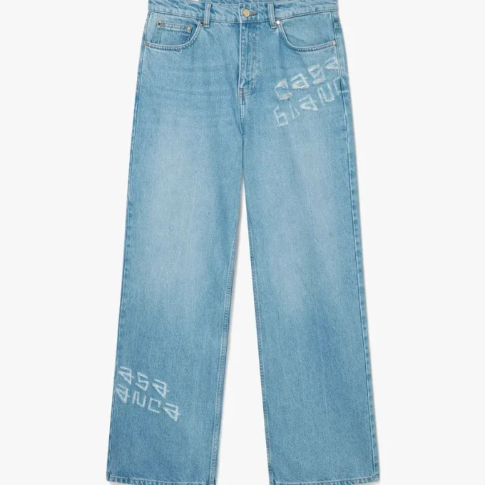 Graffiti-distressed denimjeans Graffiti-distressed denimjeans