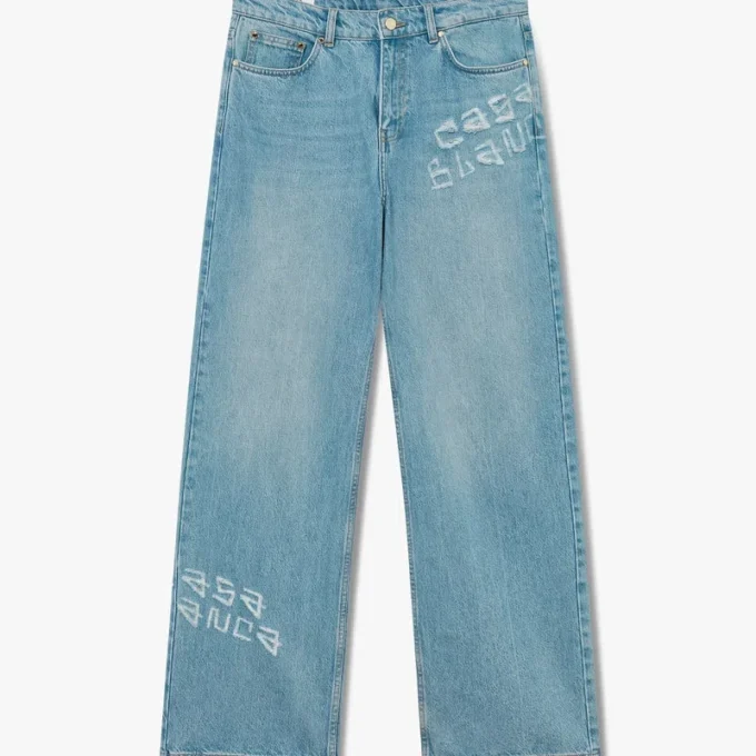 Graffiti-distressed denimjeans Graffiti-distressed denimjeans