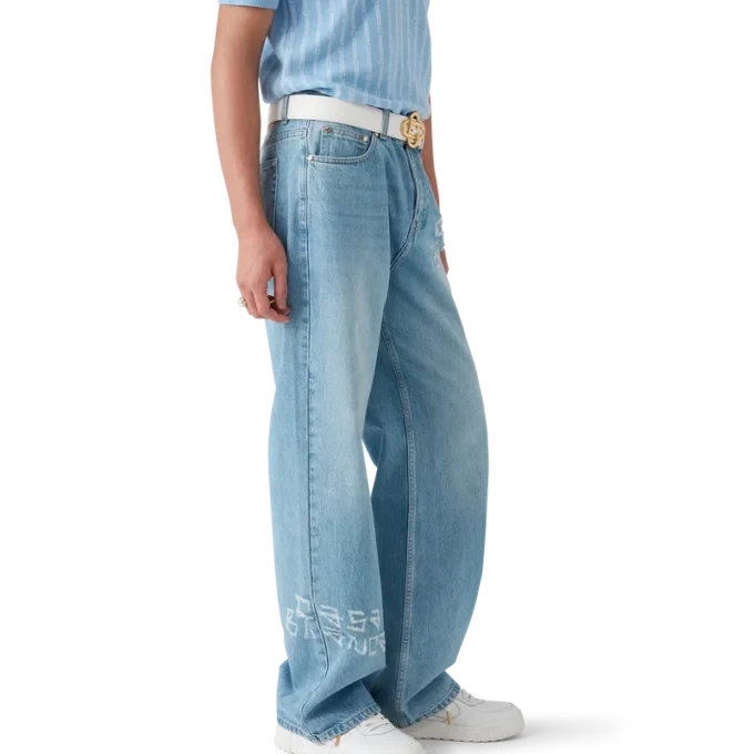 Graffiti-distressed denimjeans Graffiti-distressed denimjeans