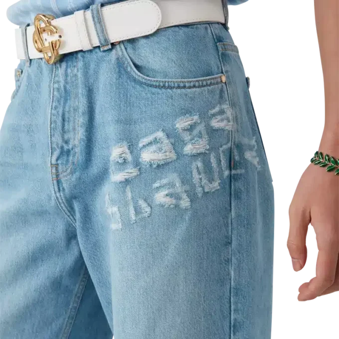 Graffiti-distressed denimjeans Graffiti-distressed denimjeans