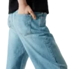 Graffiti-distressed denimjeans Graffiti-distressed denimjeans