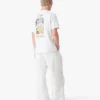 Hvid kortærmet T-shirt med tennislandskab i shorts