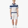 Hvid og blå stribet mesh-poloshirt med korte ærmer