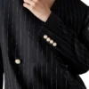 Oversized blazer i uld med nålestriber