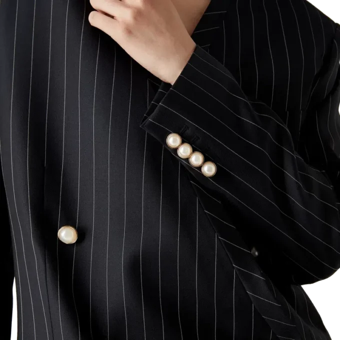 Oversized blazer i uld med nålestriber