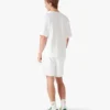 Oversized T-shirt med korte ærmer og applikeret monogram Oversized T-shirt med korte ærmer og applikeret monogram