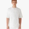 Oversized T-shirt med korte ærmer og applikeret monogram Oversized T-shirt med korte ærmer og applikeret monogram