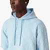 Oversized T-shirt med korte ærmer og applikeret monogram Oversized T-shirt med korte ærmer og applikeret monogram