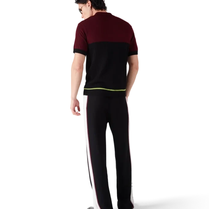 Stribet merino-strikket poloshirt Stribet merino-strikket poloshirt