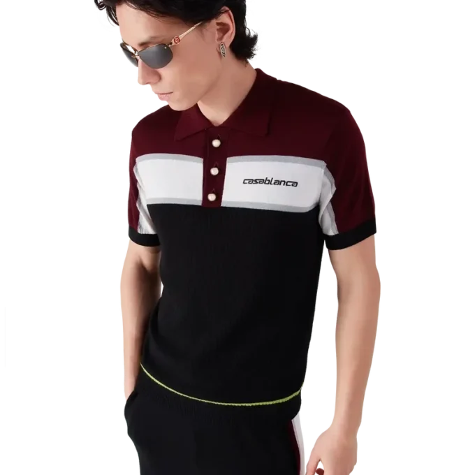 Stribet merino-strikket poloshirt Stribet merino-strikket poloshirt