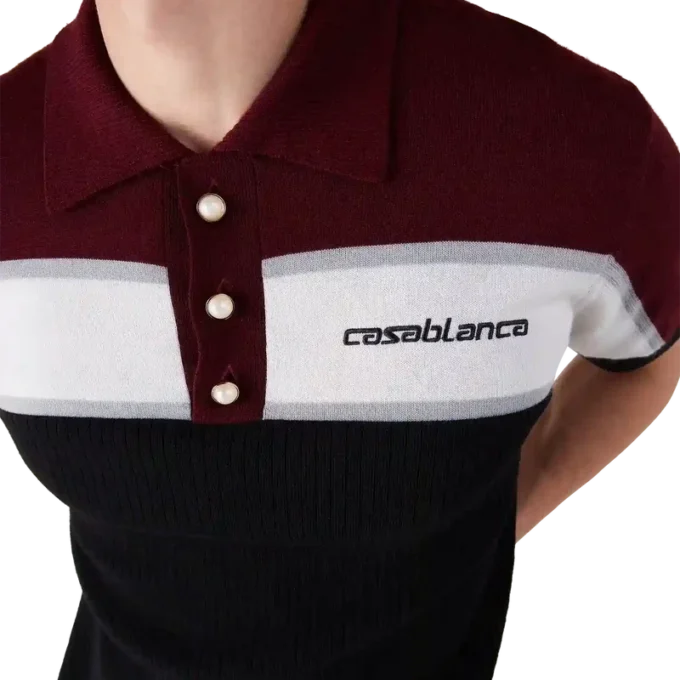 Stribet merino-strikket poloshirt Stribet merino-strikket poloshirt